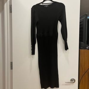 Black sweater dress with pearl buttons